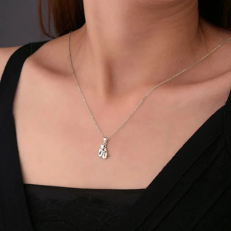 WYNTER - HUG PENDANT WITH MATCHING EARRINGS | SILVER AND GOLD